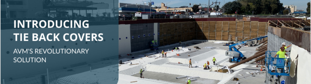 Men laying down AVM waterproofing material
