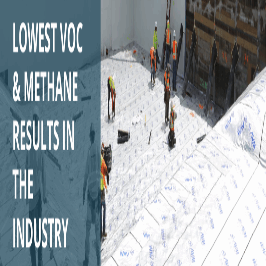 Men helping lay down AVM material